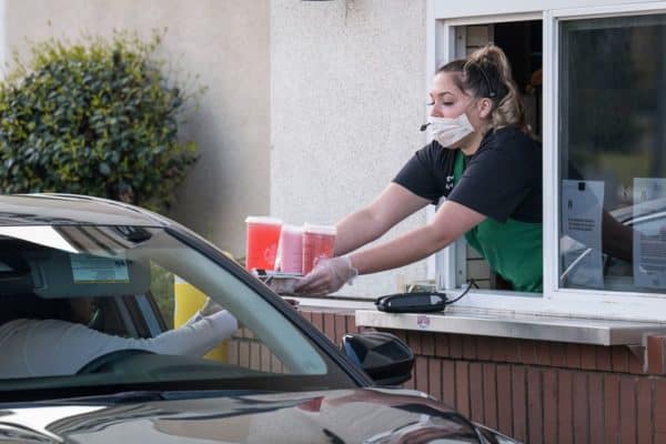 Fast-food-drive-thru-worker-with-mask-and-gloves